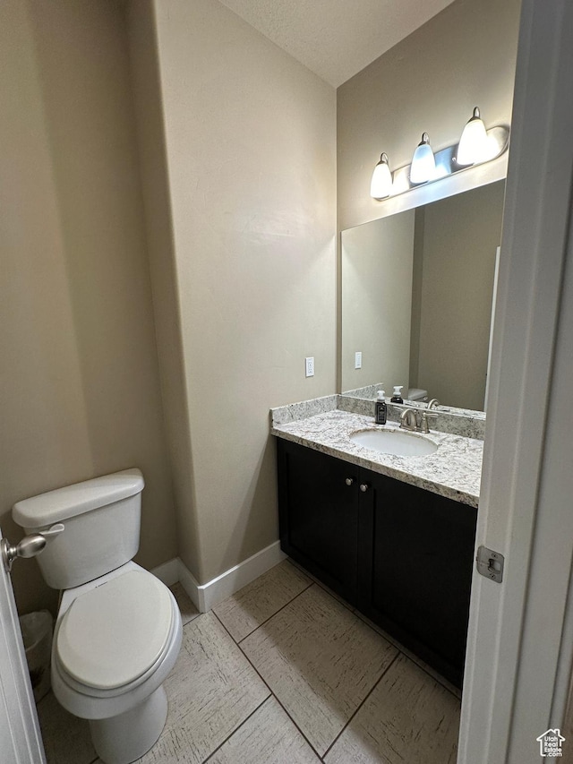338 S 1230 E, Tooele, UT 84074 - half bath with toilet, baseboards, and vanity