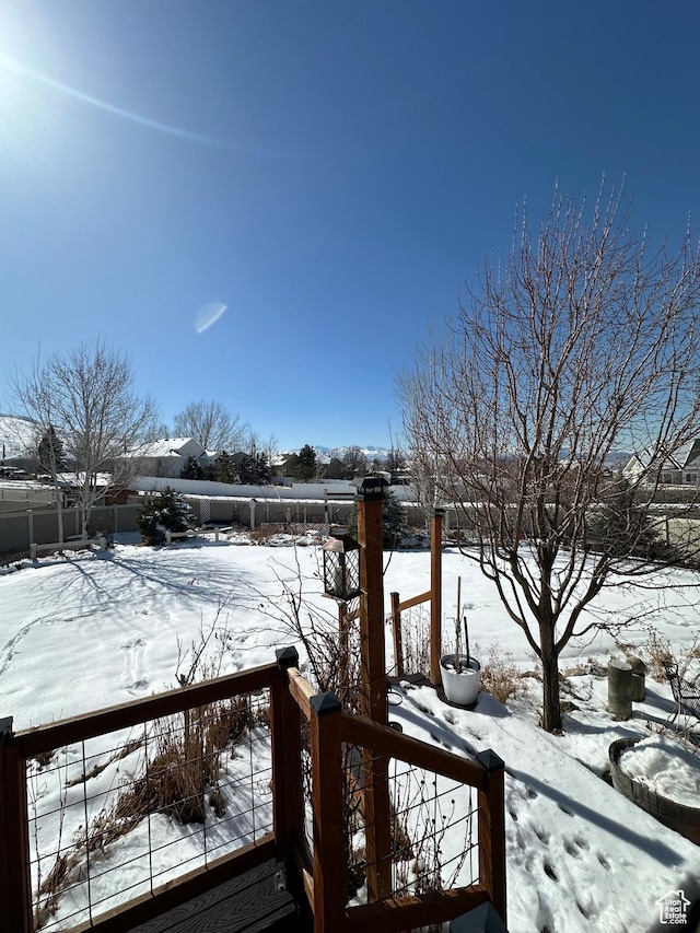 338 S 1230 E, Tooele, UT 84074 - snowy yard featuring fence