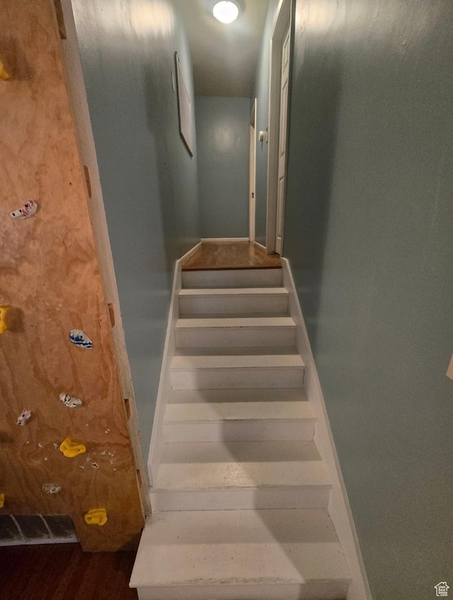 777 Simoron Dr, Ogden, UT 84404 - stairway featuring baseboards and wood finished floors