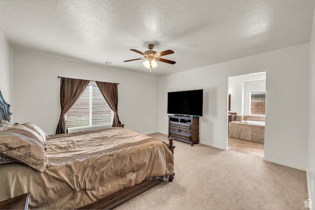 6116 S Rocky Talus Way, St George, UT 84790 - bedroom with light colored carpet, visible vents, a textured ceiling, and baseboards