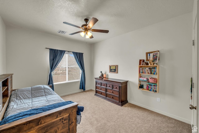 6116 S Rocky Talus Way, St George, UT 84790 - bedroom featuring baseboards, visible vents, a textured ceiling, and light colored carpet