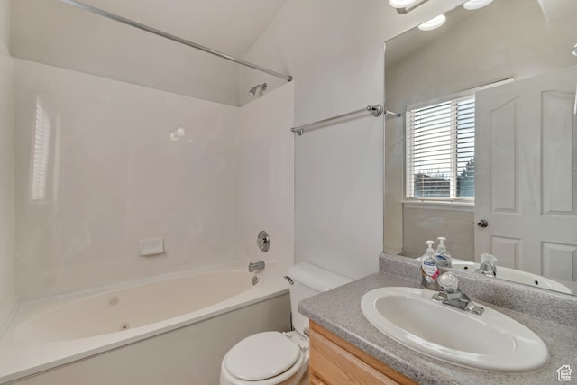 full bath featuring vanity, toilet, and shower / washtub combination