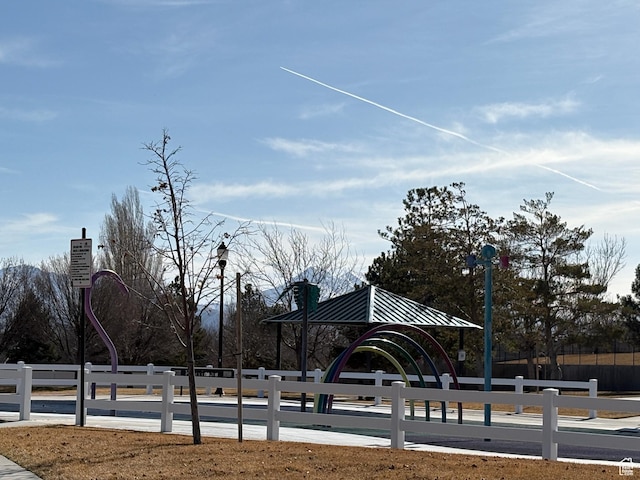 view of community with fence