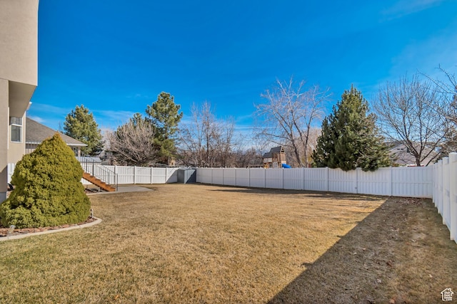 view of yard featuring a fenced backyard