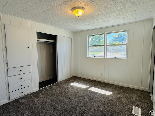 350 S 200 E, Ephraim, UT 84627 - unfurnished bedroom featuring a closet, carpet flooring, visible vents, and baseboards