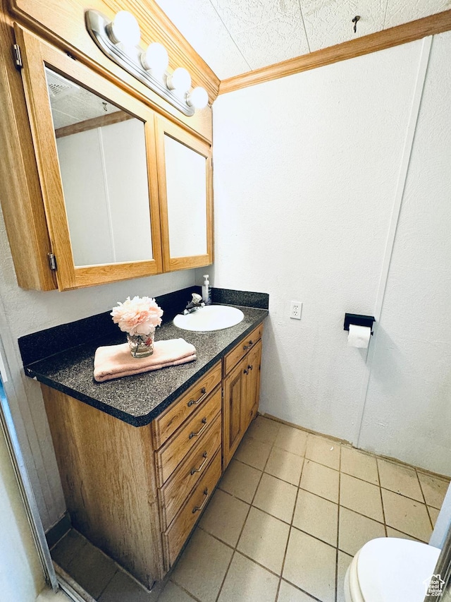 350 S 200 E, Ephraim, UT 84627 - bathroom featuring toilet, ornamental molding, vanity, and tile patterned floors