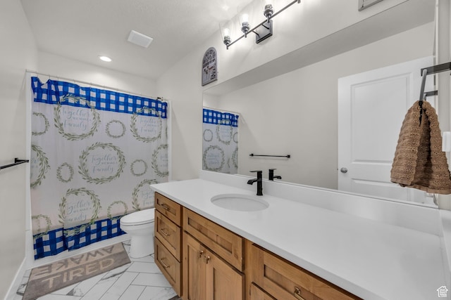 9444 N 4800 W, Elwood, UT 84337 - bathroom with vanity, toilet, curtained shower, marble look tiles, and recessed lighting
