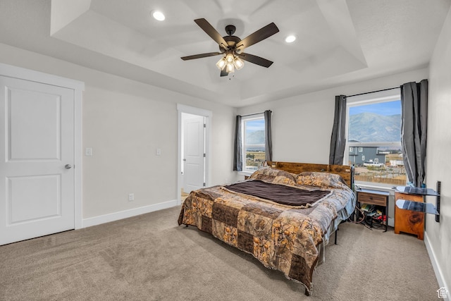 9444 N 4800 W, Elwood, UT 84337 - bedroom with a tray ceiling, carpet floors, baseboards, recessed lighting, and a ceiling fan
