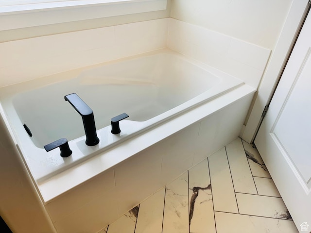 9444 N 4800 W, Elwood, UT 84337 - full bathroom with a garden tub and marble look tiles