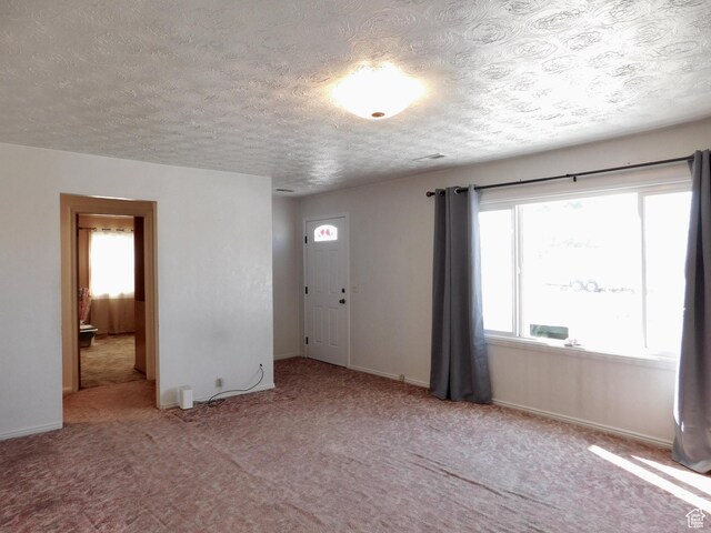 1660 W 700 S, Marriott Slaterville, UT 84404 - carpeted empty room featuring a textured ceiling and baseboards