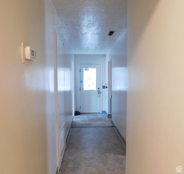 1660 W 700 S, Marriott Slaterville, UT 84404 - hallway with visible vents, concrete flooring, and a textured ceiling