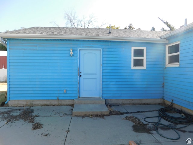 1660 W 700 S, Marriott Slaterville, UT 84404 - doorway to property featuring roof with shingles