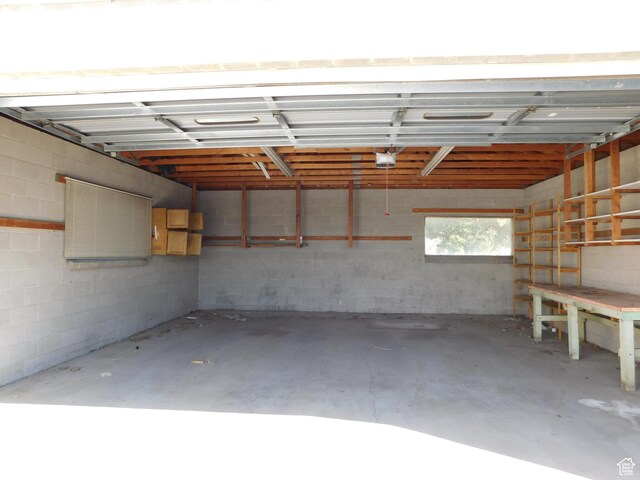 1660 W 700 S, Marriott Slaterville, UT 84404 - garage featuring a garage door opener