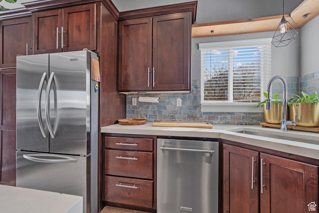 1137 S 925 E, Salem, UT 84653 - kitchen with tasteful backsplash, appliances with stainless steel finishes, light countertops, and a sink