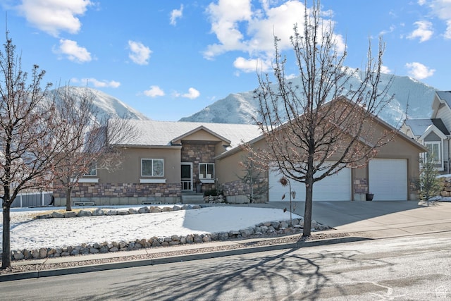 1137 S 925 E, Salem, UT 84653 - ranch-style home featuring stone siding, stucco siding, an attached garage, and driveway