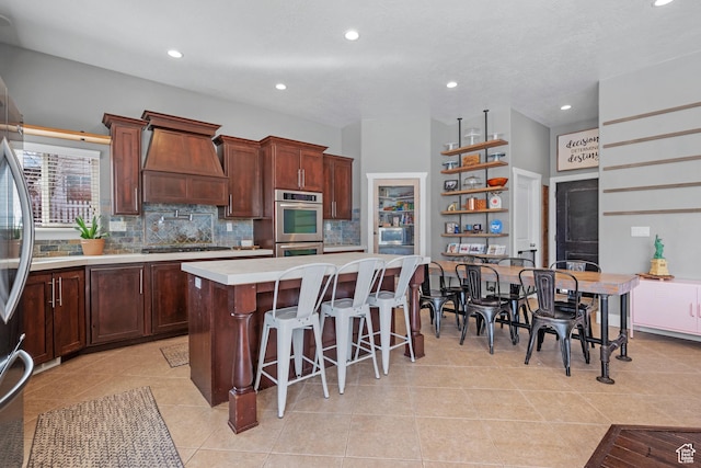 1137 S 925 E, Salem, UT 84653 - kitchen with tasteful backsplash, light countertops, appliances with stainless steel finishes, custom exhaust hood, and open shelves