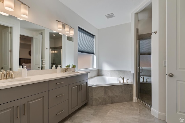 1392 N Marfil Way, Washington, UT 84780 - full bathroom with a garden tub, double vanity, a stall shower, and a sink