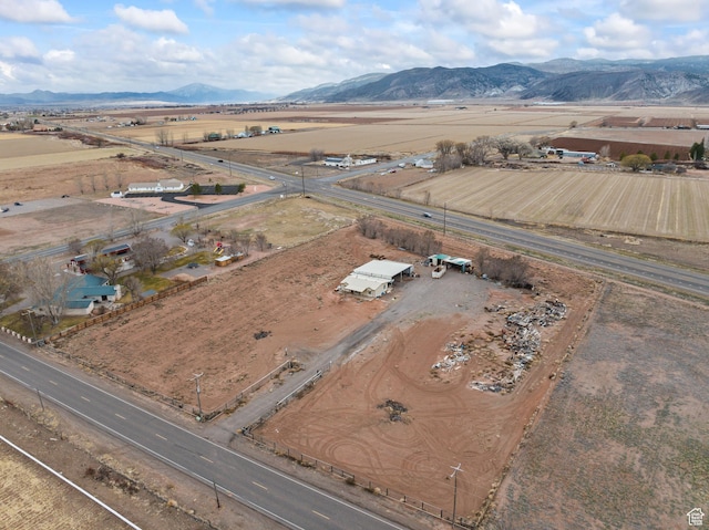 birds eye view of property featuring a rural view and a mountain view