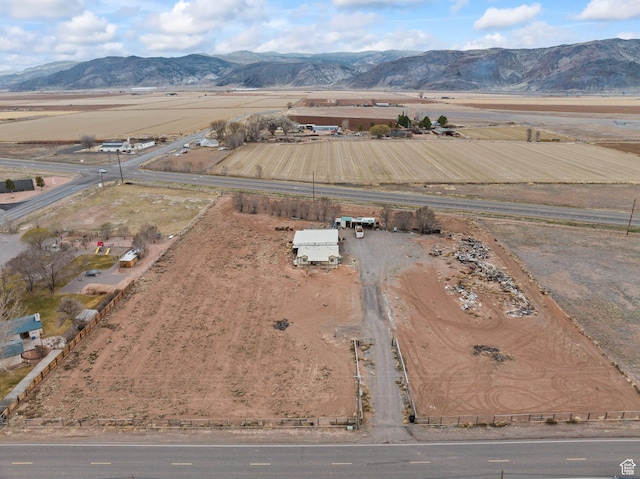 aerial view featuring a rural view and a mountain view
