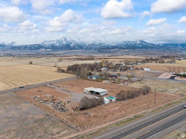 birds eye view of property featuring a rural view and a mountain view