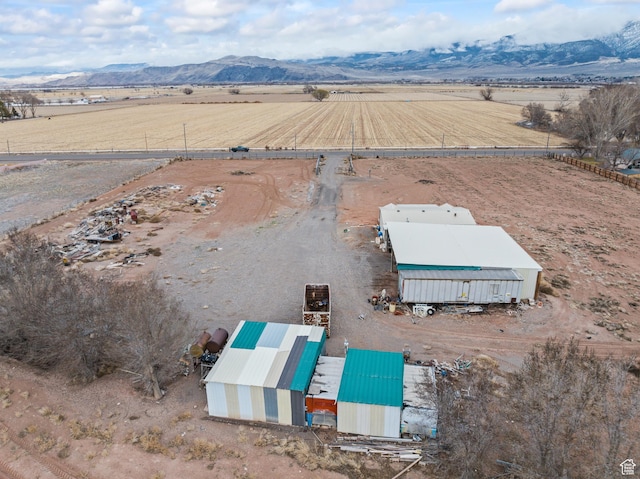 bird's eye view with a rural view and a mountain view