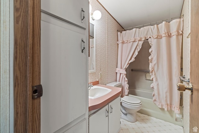full bath featuring tile patterned floors, shower / bath combo with shower curtain, toilet, wallpapered walls, and vanity