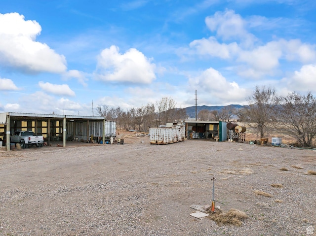 exterior space featuring a mountain view