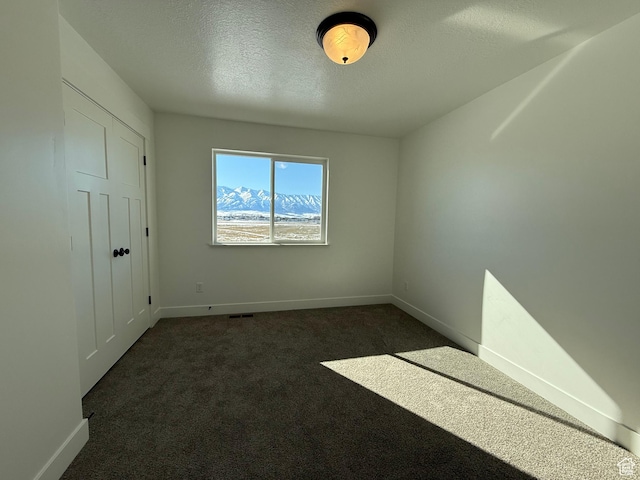 3269 S 1000 W, Nibley, UT 84321 - carpeted empty room featuring visible vents, a textured ceiling, and baseboards