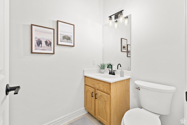 539 E Normandy Dr, Provo, UT 84604 - bathroom featuring toilet, vanity, and baseboards