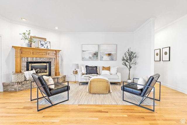 539 E Normandy Dr, Provo, UT 84604 - living room with a brick fireplace, crown molding, baseboards, and wood finished floors