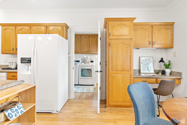 539 E Normandy Dr, Provo, UT 84604 - kitchen featuring light countertops, white appliances, ornamental molding, washing machine and clothes dryer, and light wood-style floors
