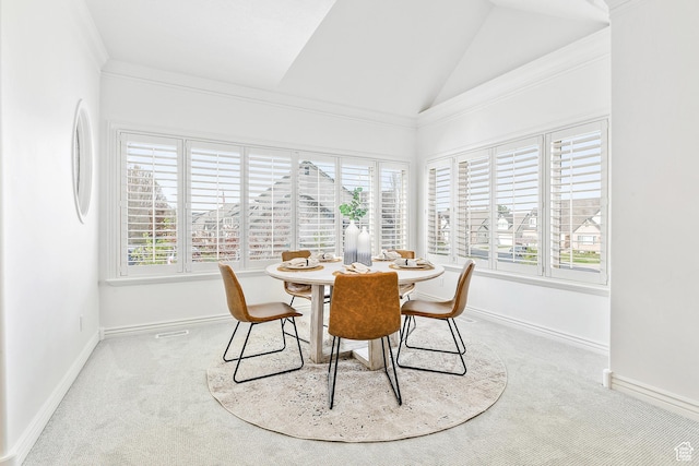 539 E Normandy Dr, Provo, UT 84604 - dining space with baseboards, carpet floors, and vaulted ceiling