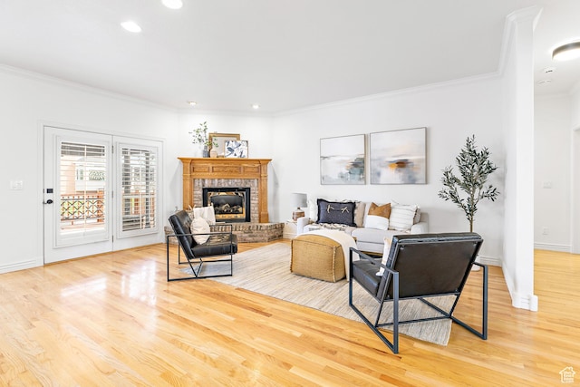 539 E Normandy Dr, Provo, UT 84604 - living area with crown molding, recessed lighting, light wood-type flooring, baseboards, and a fireplace