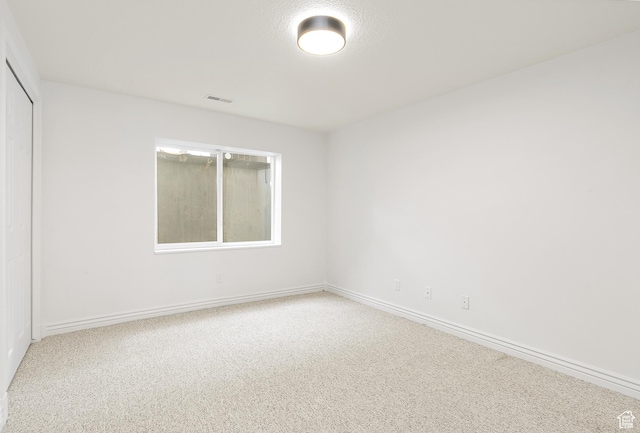 539 E Normandy Dr, Provo, UT 84604 - spare room featuring baseboards, visible vents, and carpet