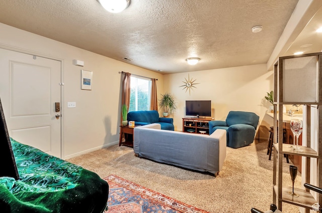 living room with baseboards, a textured ceiling, and carpet flooring