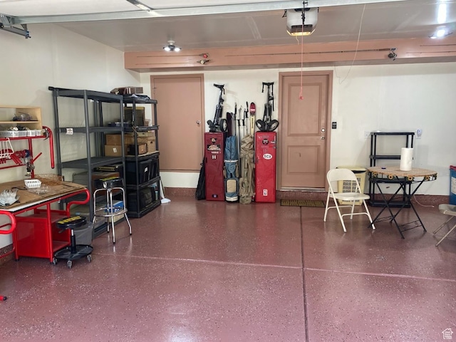 garage featuring a garage door opener