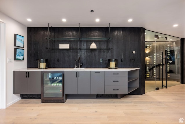 2559 Lupine Ln, Park City, UT 84060 - indoor wet bar with beverage cooler, light wood-type flooring, and recessed lighting