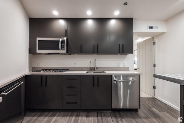 2559 Lupine Ln, Park City, UT 84060 - kitchen featuring appliances with stainless steel finishes, light countertops, dark wood-style floors, recessed lighting, and modern cabinets