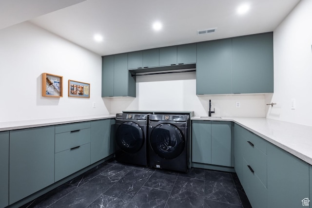 2559 Lupine Ln, Park City, UT 84060 - laundry room featuring washer and dryer, cabinet space, dark marble finish floors, and recessed lighting