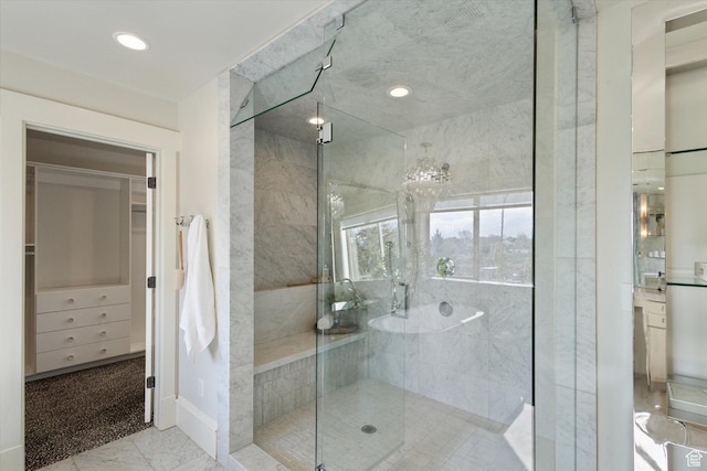 full bathroom with a shower stall, marble finish floor, and recessed lighting