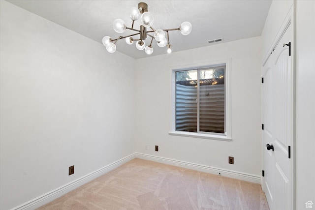 unfurnished room featuring light colored carpet, visible vents, baseboards, and an inviting chandelier