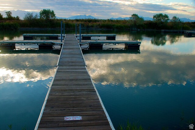 2421 S Blue Water Ln E, Saratoga Springs, UT 84045 - dock area featuring a water and mountain view