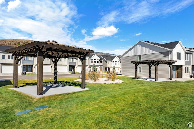 529 Richland Valley St, Garden City, UT 84028 - view of community featuring a yard, a residential view, and a pergola