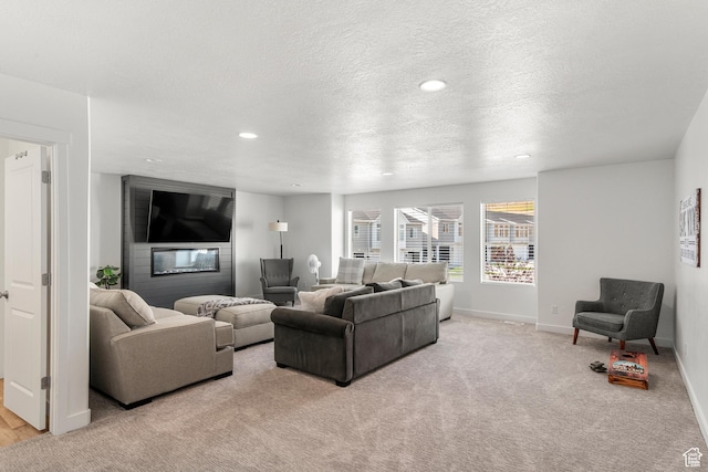 529 Richland Valley St, Garden City, UT 84028 - living area featuring recessed lighting, light colored carpet, baseboards, and a textured ceiling