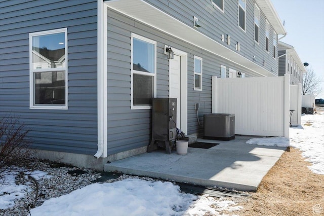 exterior space featuring cooling unit and a patio
