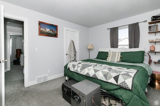carpeted bedroom with baseboards and visible vents