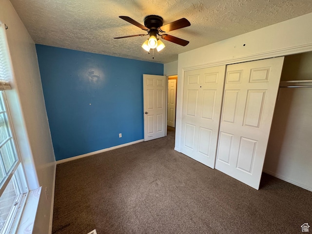 350 S 50 W, Ephraim, UT 84627 - unfurnished bedroom with a closet, baseboards, ceiling fan, a textured ceiling, and carpet flooring