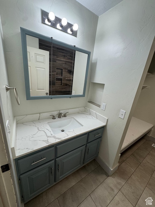 350 S 50 W, Ephraim, UT 84627 - bathroom with vanity, baseboards, and tile patterned flooring