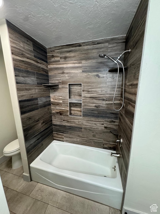 350 S 50 W, Ephraim, UT 84627 - bathroom featuring washtub / shower combination, tile patterned flooring, a textured ceiling, and toilet