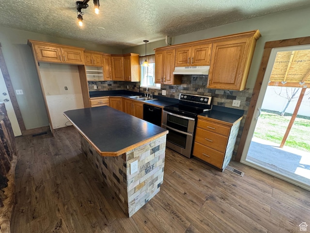 350 S 50 W, Ephraim, UT 84627 - kitchen featuring dishwasher, a sink, dark countertops, under cabinet range hood, and range with two ovens